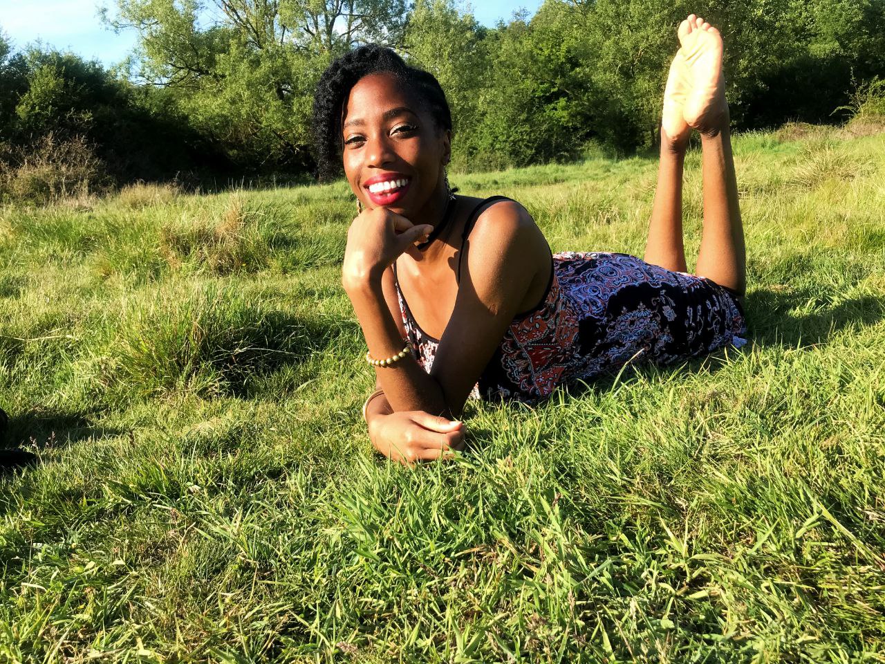 Nutritionist Rochelle sitting on grass